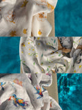 The Gift Set - all three Ari Baby muslin blanket prints (Blossom Bee, Koala Kuddle and Tropic Turtle) draped poolside
